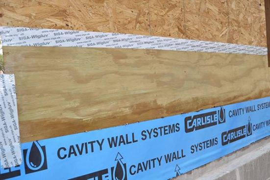 Siga Wigluv on the PT Plywood to OSB seam.