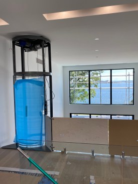 As the general contractor, the author helped oversee the installation, making sure that finish flooring was protected from the scaffolding needed to install the glass panels and that balcony glass aligned with the elevator door. All glass surfaces were protected until the end of job. 