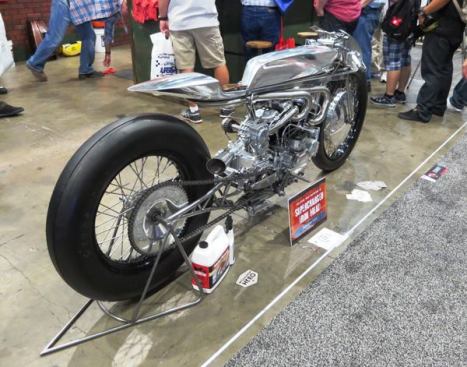 This Supercharged Ironhead was custom-built by 
Hazan Motorworks. It was at the booth of some company that makes rust remover. Do I remember what company that is? No way—who’s going to look at jugs of rust remover when they could look at this instead? I don’t know anything about this machine other than that it’s an awesome combination of retro and super-modern.