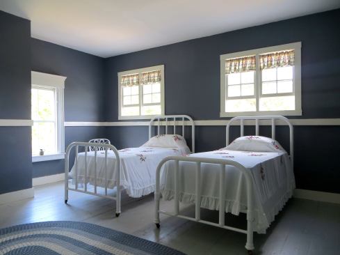 The third floor housed the servants of the home, and some openings were cased with simple flat square-edge boards while others recieved a more elaborate treatment--on adjacent walls in this room.
