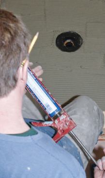 I applied a double ring of Noblesealant 150 around the drain flange.