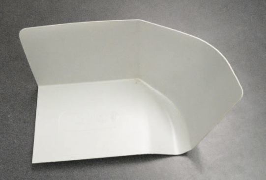 Molded polyethylene kick-out flashings, like this one from Raintek, can be trimmed to fit different foam thicknesses. Kick-out flashings are installed with the step flashings.