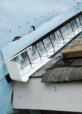 As we install the flashings, we take care to integrate them with the housewrap so that there is a continuous drainage plane under the siding.
