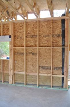 24-inch-o.c. 2&times;6 studs lined up nicely with the load path of the trusses above.