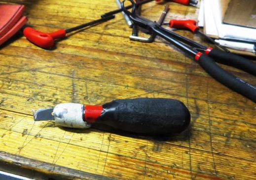 This is one of the knives used to trim excess midsole material. The work is done quickly; the next worker in line goes over the boots more carefully and performs the finishing touches.