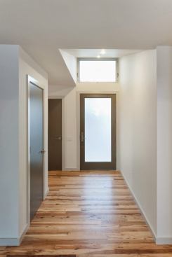 Notice the white base landing on the floor with no shoe moldings.