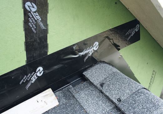 Flashing taped to sidewalls