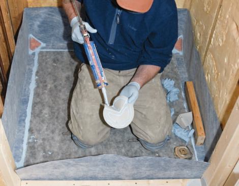 The preformed outside corners were next, two per jamb, applied directly to the wood with sealant.