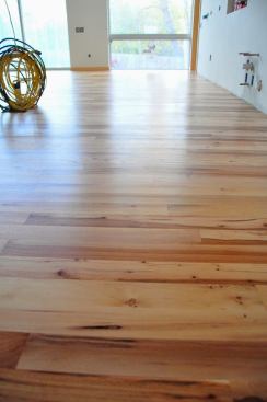 Hard to capture on camera the gloss level of satin. It’s my favorite finish. Notice the floors are finished before cabinet install.