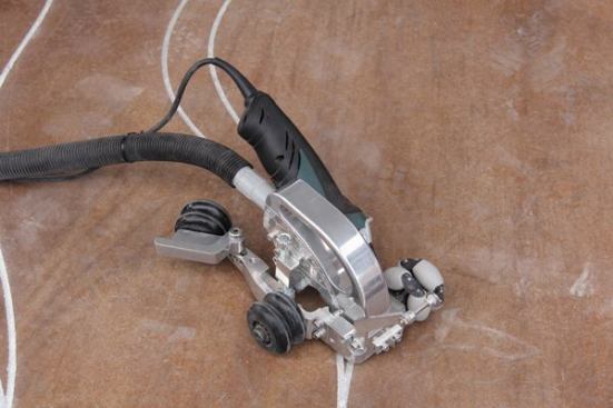 This unusual grinder-based tool—the Engrave-A-Crete 
Spiider—is used to cut decorative patterns in concrete. Save your pennies, though, it goes for about $1,500.