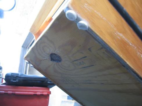 Glides on the front bottom side of the main boxes help them slide in and out.