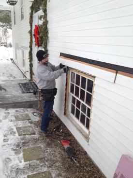 The clapboards need to be taken out carefully to avoid ripping the tarpaper underlayment around the window.