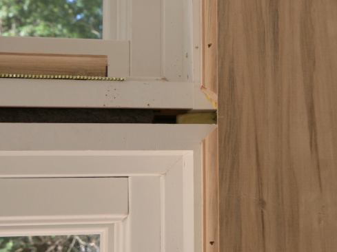 …so we miter-cut the mull jambs—chiseling out the extra material—to receive the 1 1/2-inch-wide horizontal mull trim