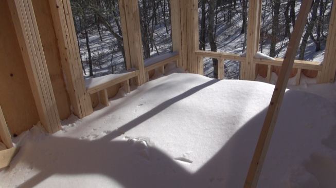 Snow covered the partially framed Harwich addition to nearly the depth of the windowsills after the storm.