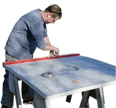 Cutting the base to size was easy. The instructions recommend scoring and snapping the base, as you would do with drywall, but with a product this costly I wanted to make sure I had a clean cut. So I cut first from the top, using a utility knife.