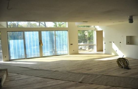 We install hardwood floors shortly after drywall is completed.