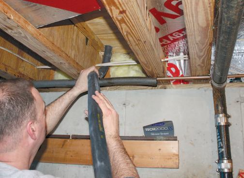 The installers ran the fluid lines to the utility room.
