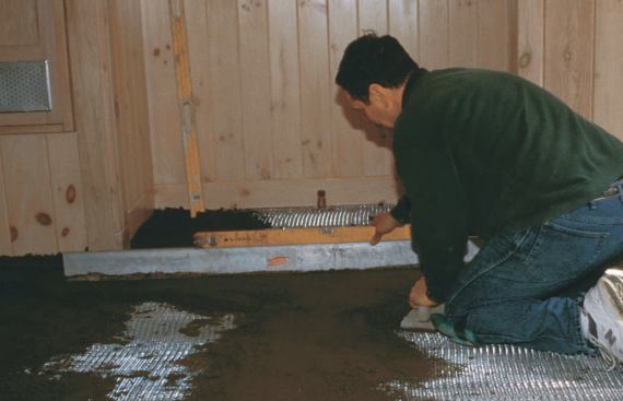 The primary "boss line" of screed establishes the mud bed level between critical points -- in this case opposing door openings.