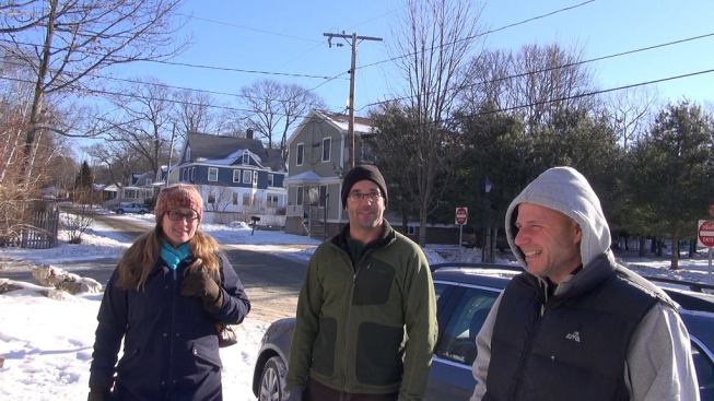 Contractor Heather Thompson (left), project manager Mark Pollard (center), and client Will Crosby (right) share a laugh at the job site in January.