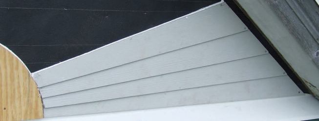 Because of the small overlap, I ran a bead of caulk along the top edge of each clapboard.