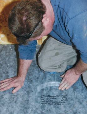 I firmly pressed the membrane into the sealant around the drain.