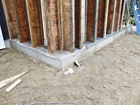 A metal termite shield protects the foam insulation below.