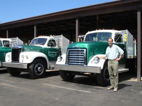 Gow Litzenburger with “Sea Monkey,” a 2-ton 51 GMC. The truck to the left is “Bulldog,” a 1965 B Model Mack.