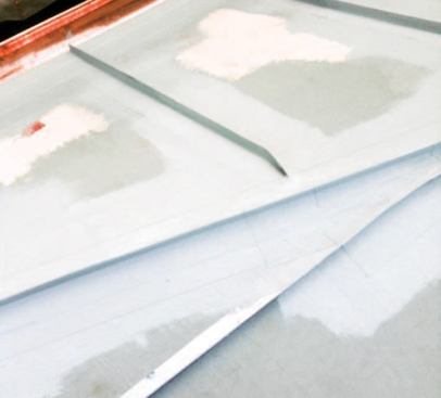 The metal and wood surfaces were covered with polyester fabric and a bedding coat.