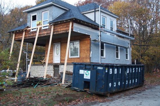 A view of the house with the front porch removed.