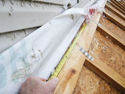 The bottom chord of the gable truss had been attached to the plate below with 16-penny toenails more than 2 feet on-center.