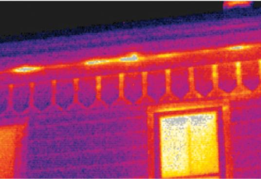 Exfiltrating warm air from a heated building often shows up as "hot spots" around the eaves.