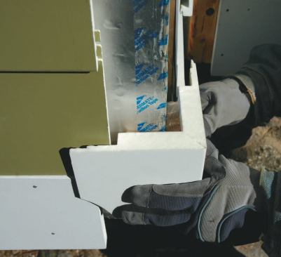 Vertical trim pieces are rabbeted to allow the siding to move horizontally behind them.