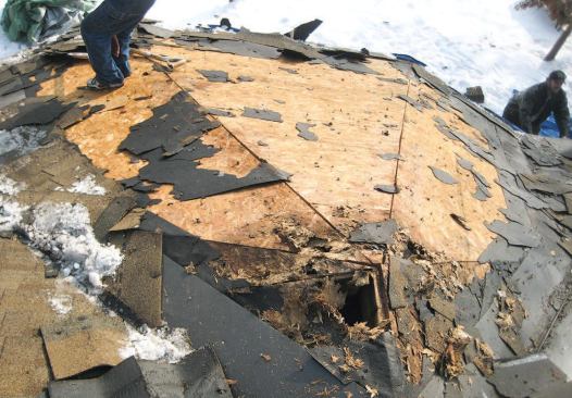 While the initial problem appeared to be a leaking skylight, there were other areas on the roof that had deteriorating OSB sheathing and corroding plywood clips and fasteners.