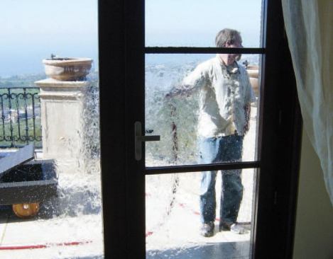 After getting up to speed on previous work that had been done, we used a hose to perform a water test, which would help us figure out where the water was getting in.