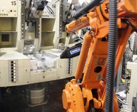 This computer-controlled robot sprays the form for the outsole and midsole with a release agent so the boot doesn’t stick when it’s time to remove it. 
Click here for video.