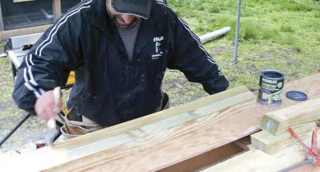 Bottom: I applied Woodlife Coppercoat preservative to all the pieces to help prevent the wood from rotting, and the frame was ready to assemble.
