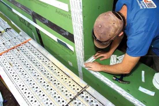 Strips of tape are also applied in the window buck at joints and in corners.