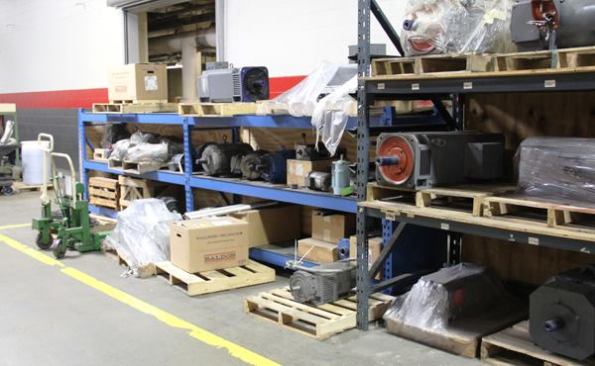 This is something you see in every factory, spare parts and motors to repair the machines. In addition to a maintenance department, most factories have machine shops with full-time machinists to make parts that are needed quickly or cannot be bought ready-made.
