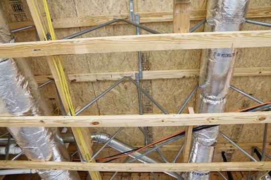 That's a big trunk line for the HVAC system and it ran in this truss space easily!