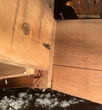 Inside the attic, the problem was immediately apparent: One ridge board had dropped approximately 1 3/4 inches.