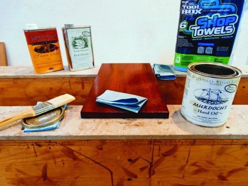 For applying all oil finishes, he brushes on a thick coat, lets it soak in for several minutes, and then rubs it out with blue shop towels, which don’t leave annoying lint behind.