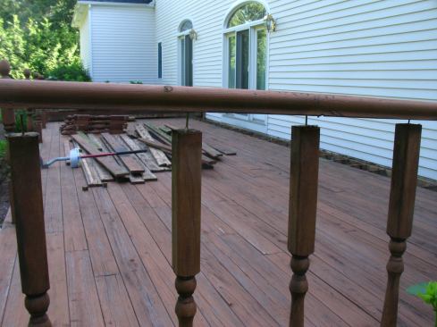 Held together with finish nails, the railing wasn't strong enough to meet code. The balusters were too far apart, too, with 8-inch instead of code-maximum 4-inch gaps between balusters.