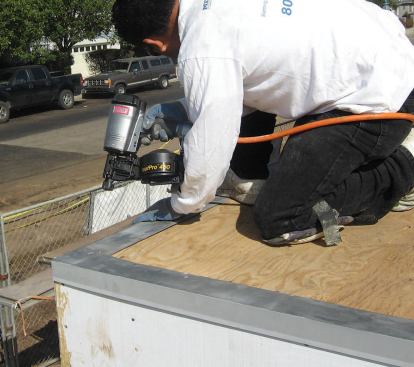 Since the deck slopes to the exterior, the gravel stop is installed from low to high so that the pieces lap shingle-style.
