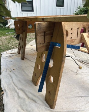 “Difficult” items, such as a framing square, are easily stored on the sawhorse.