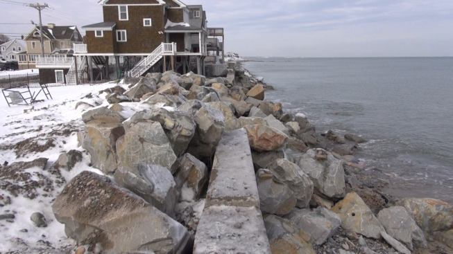 After the storm passed, Marshfield Town Engineer Rod Procaccino directed this emergency repair, accomplished with large boulders originally intended for nearby revetment work. Town crews along this stretch of shoreline maintain the aging seawall as best they can when funds are available.