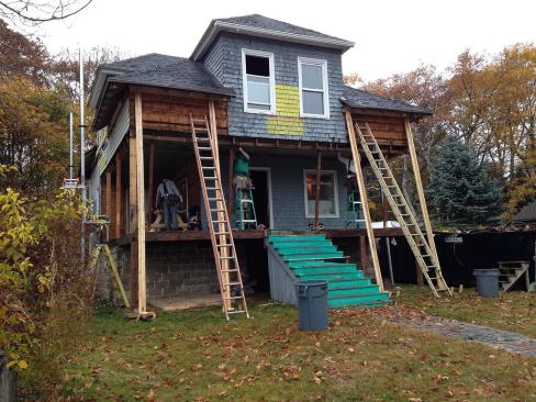 After installing temporary shoring, Thompson Johnson Woodworks begins demolition of the existing front porch in September.