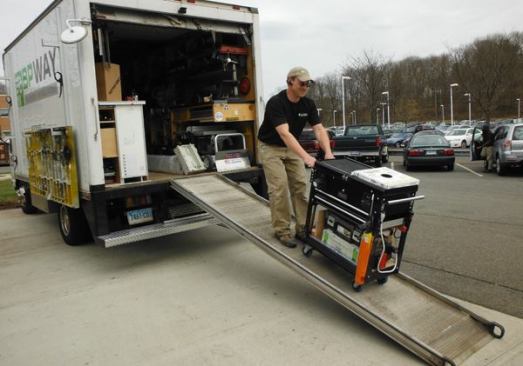 When I get to the job I roll the cart down the truck’s ramp and into the building.