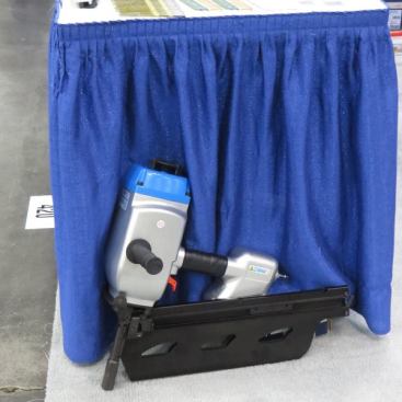 The mother of all nailers—seen at the Fasco America booth. This particular gun drives 4- to 6 3/8-inch plastic collated stick nails and is so large it requires a side handle. It’s designed for fastening the kind of large timbers found in docks, pole barns, retaining walls, and log cabins. You don’t want to know how much this gun weighs. If you have to ask you’re too weak to lift it.