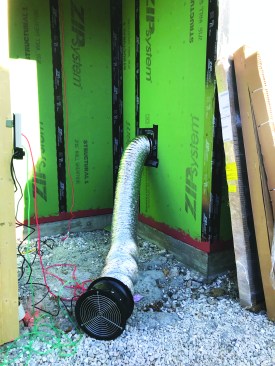 On homes with very tight envelopes, the author sometimes tests for air leakage with a Duct Blaster—the blower door’s tiny cousin—which provides greater accuracy when the flow rate is extremely low. A blower door can also be used effectively for low-flow readings using these two tips (both from Gary Nelson of TEC):  1. Put a bungie cord around the fan to really clamp down on the leakage between the door and fan. 2. Keep a small ziplock bag with a couple of scraps of fiberglass insulation to tuck into the corners of the door panel during tests. This will stop the biggest leaks in the corners.