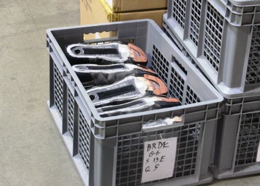 The main business of the plant is assembly; this was shot in the receiving area. Boot uppers have been unboxed, inspected, and placed in bins that will be stacked in the assembly area. The strip down the middle is a composite shank and the horseshoe-shaped piece in front is reinforcement for an already installed steel or composite toe. The shank provides mid-foot torsional support and may vary in thickness and width depending on the application; a wide stiff shank will reduce the pressure to your arch when you stand on the rungs of a ladder. Components are sourced from multiple countries, including the U.S. According to Keen, they buy from whoever is best at making that component, though I’m sure price and availability come into it too. These particular uppers were fabricated in China. I saw others that came from India.